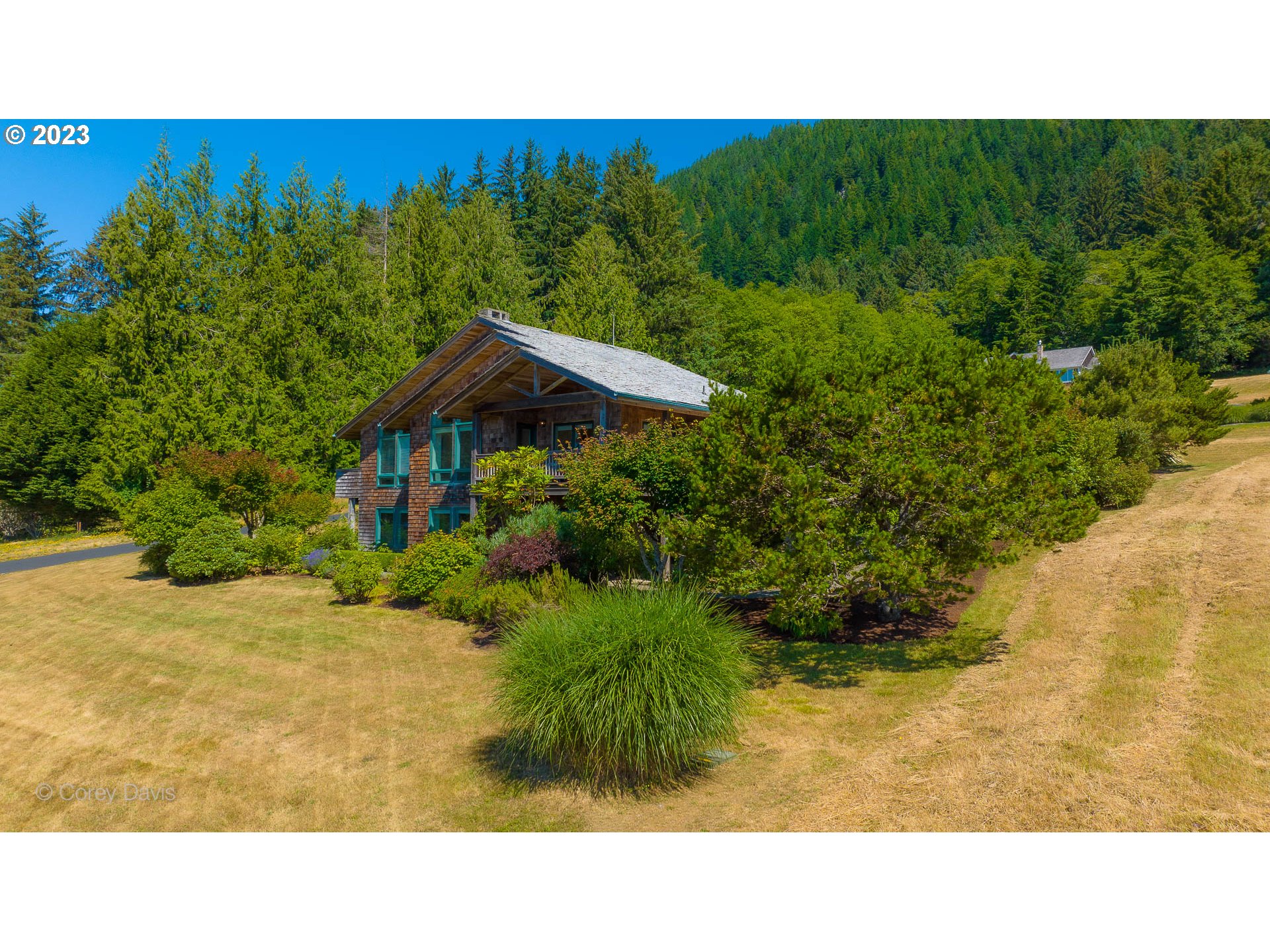 38680 Meadow Loop Nehalem, OR 97131 - Photo 25 of 44 a view of a garden with a bench
