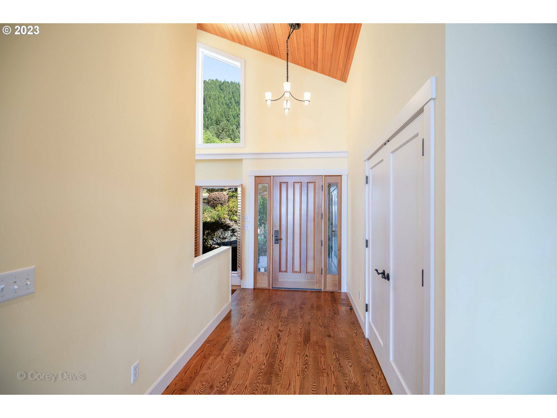 38680 Meadow Loop Nehalem, OR 97131 - Photo 28 of 44 a view of a hallway with wooden floor and staircase