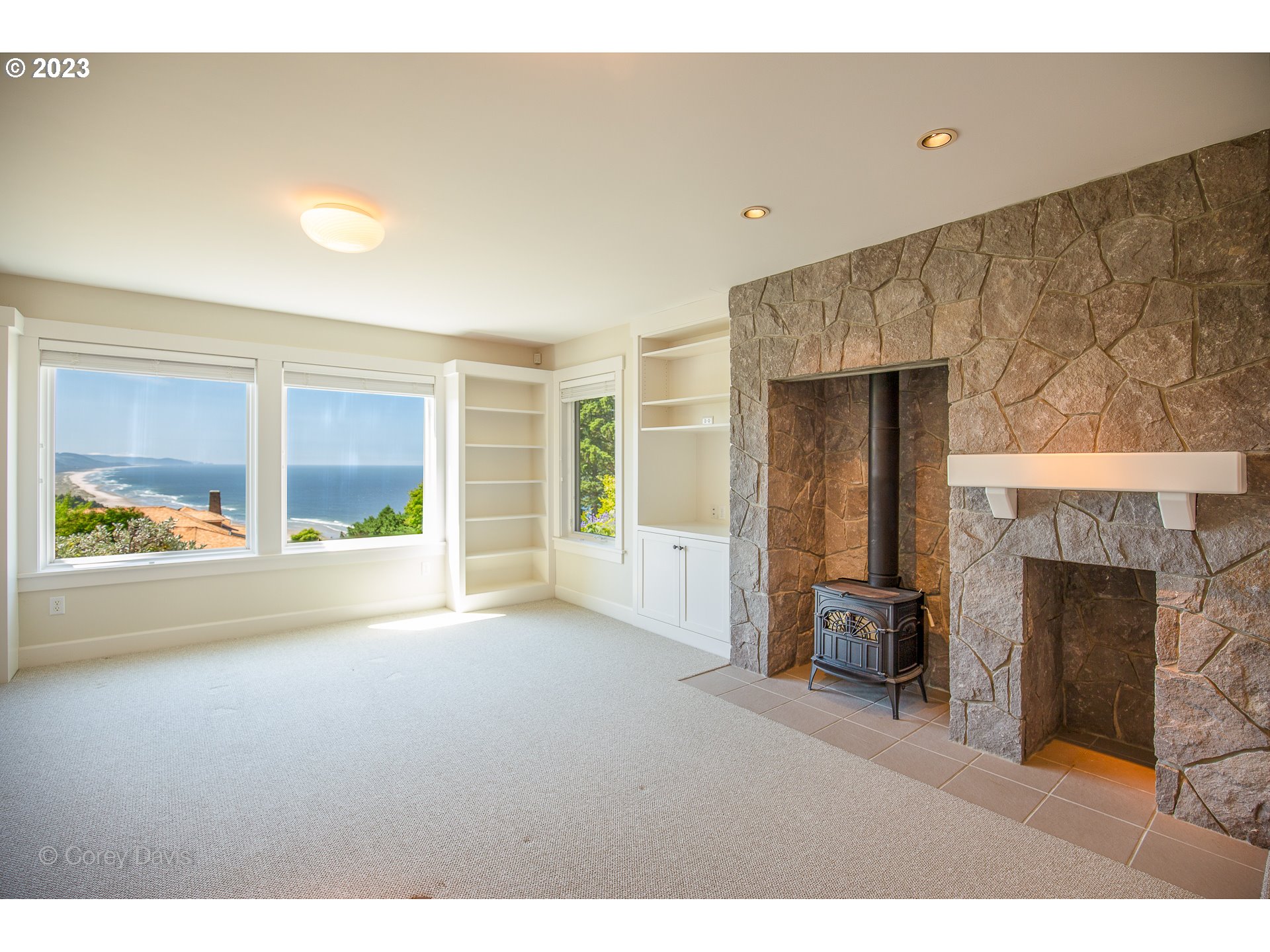 38680 Meadow Loop Nehalem, OR 97131 - Photo 29 of 44 a view of an empty room with a fireplace