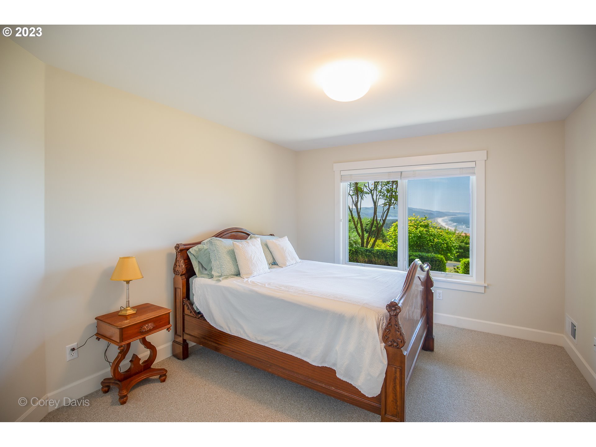38680 Meadow Loop Nehalem, OR 97131 - Photo 31 of 44 a bedroom with a bed and a window
