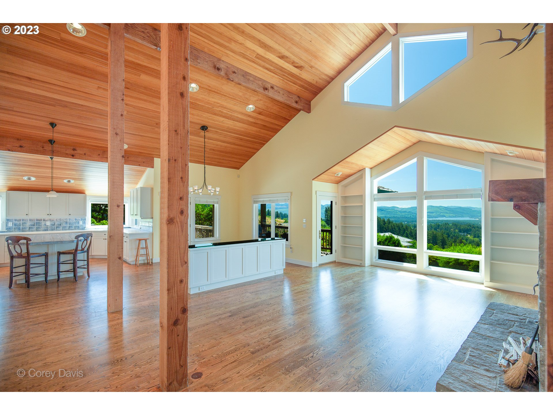 38680 Meadow Loop Nehalem, OR 97131 - Photo 7 of 44 wooden floor in an empty room with wooden floor and windows