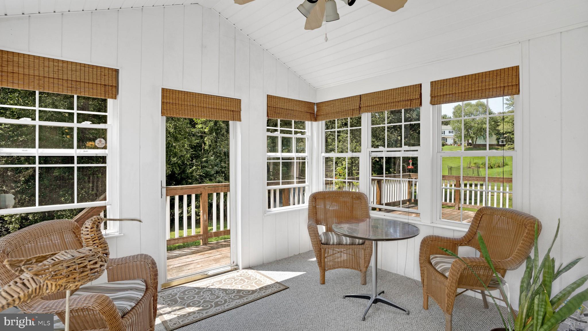 549 Small Reward Road Huntingtown, MD 20639 - Photo 12 of 33 Three season porch and access to deck