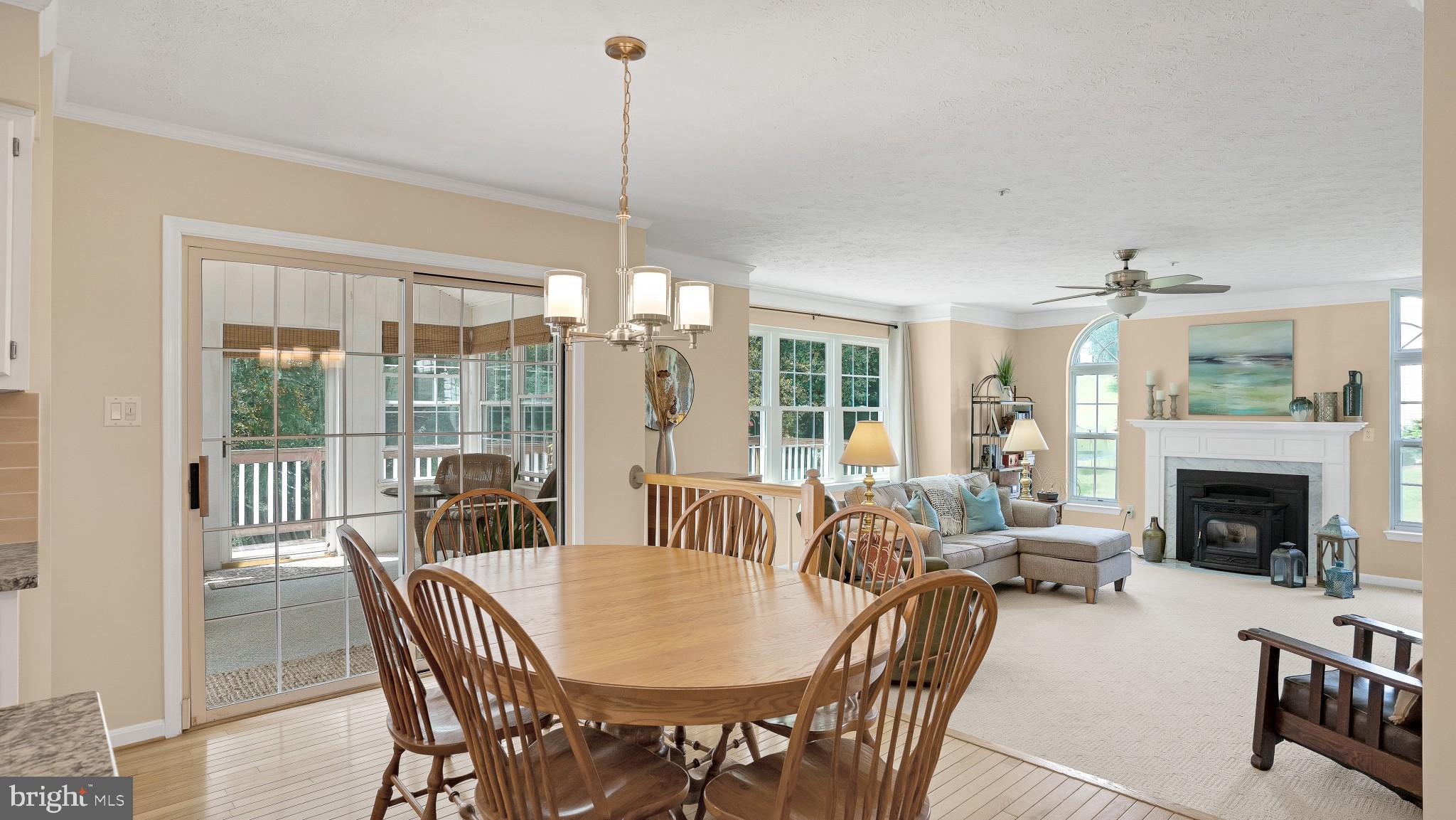 549 Small Reward Road Huntingtown, MD 20639 - Photo 5 of 33 Open layout to living room & access 3 season/deck