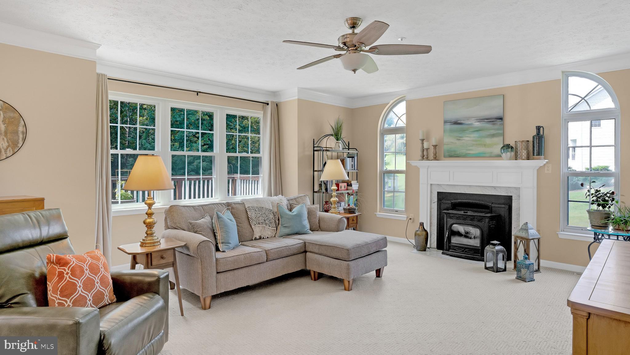 549 Small Reward Road Huntingtown, MD 20639 - Photo 6 of 33 Living room with fireplace