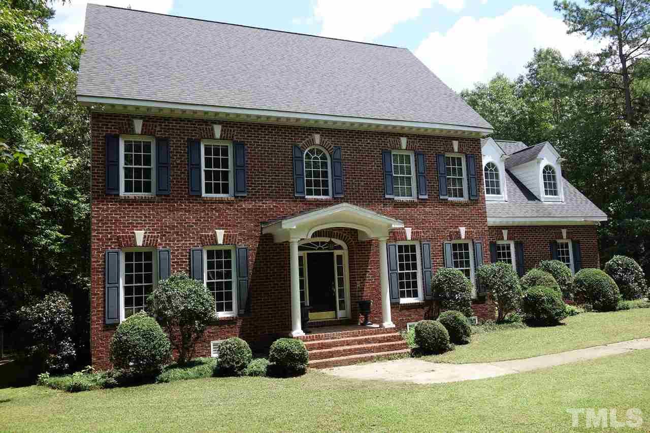 11320 Honeycutt Road, Unit LOT12 Raleigh, NC 27614 - Photo 1 of 25 Traditional brick front home situated on 0.95 acre secluded home-site.