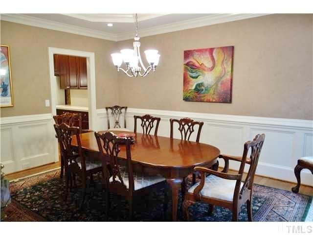 11320 Honeycutt Road, Unit LOT12 Raleigh, NC 27614 - Photo 6 of 25 The formal dining room has hardwood floors, a trey ceiling, & wainscoting.