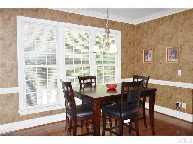 11320 Honeycutt Road, Unit LOT12 Raleigh, NC 27614 - Photo 8 of 25 Sunny breakfast nook has hardwood floors & opens to the kitchen & family room.