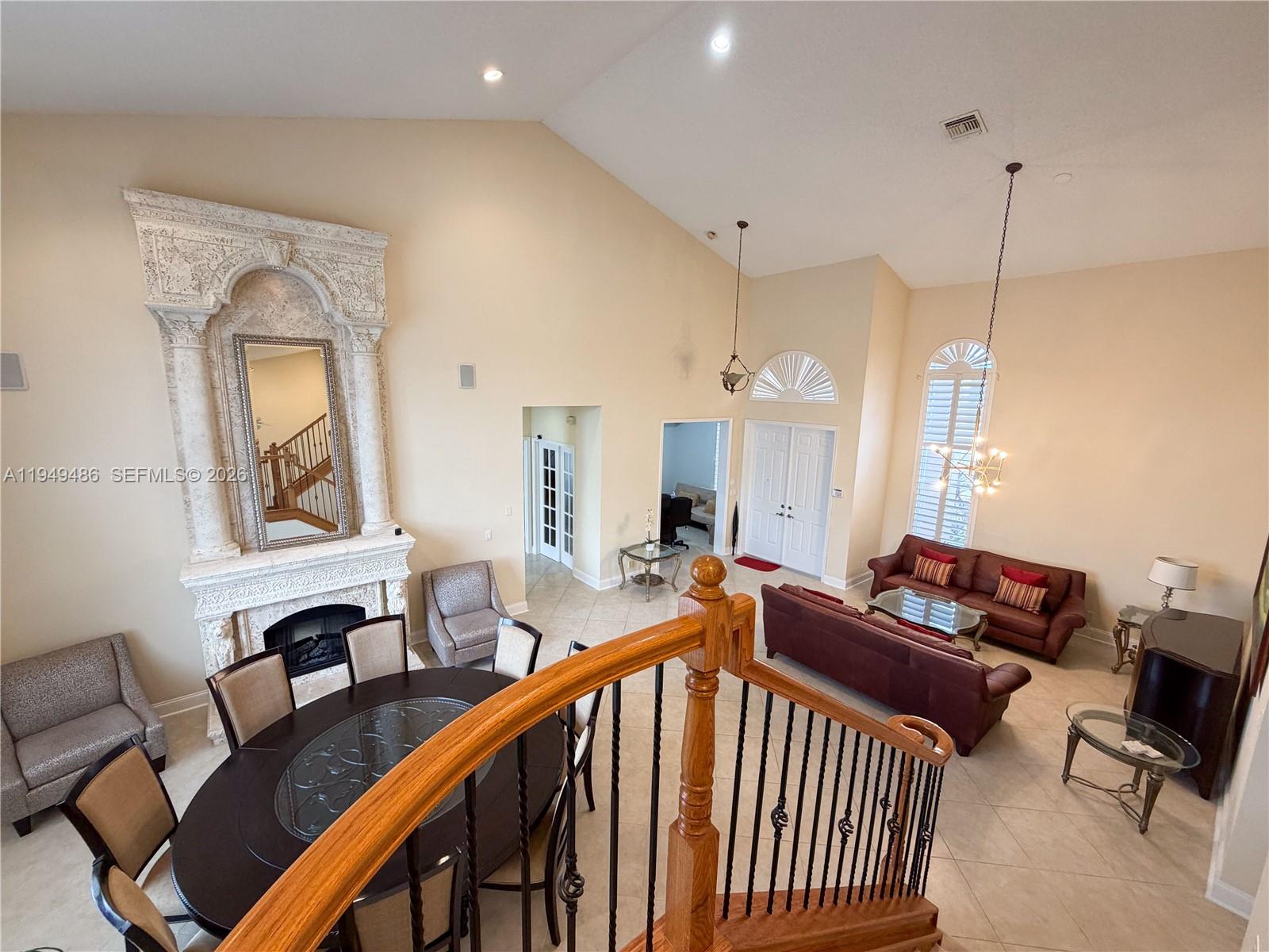 3279 Huntington Weston, FL 33332 - Photo 11 of 40 a living room with furniture and a window