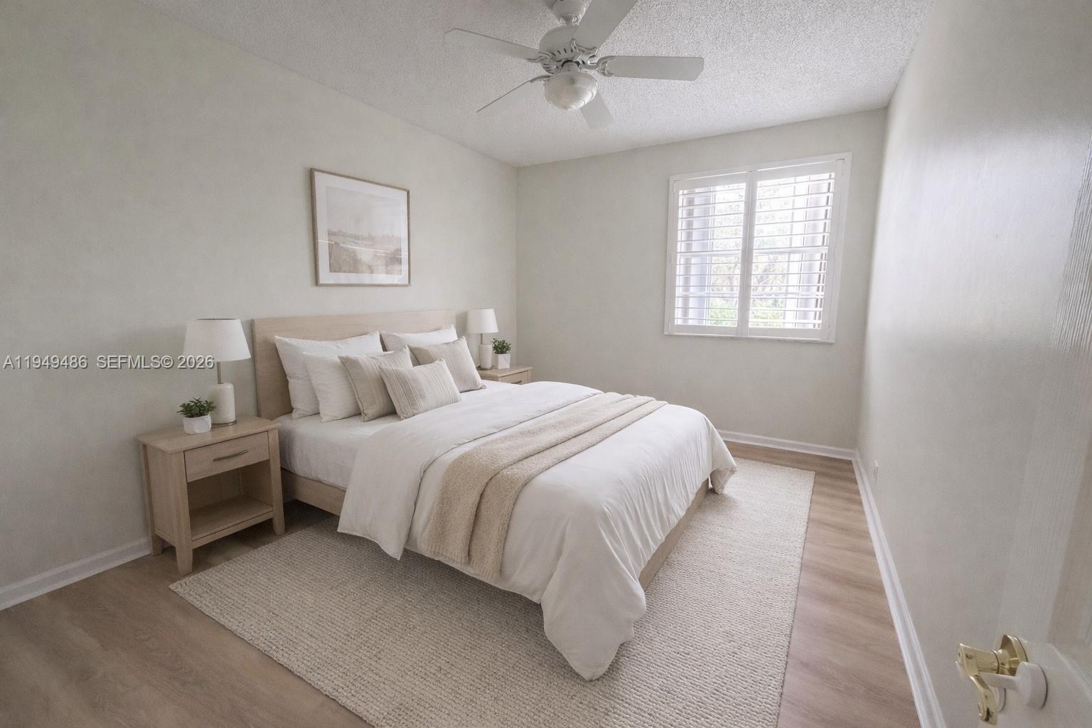 3279 Huntington Weston, FL 33332 - Photo 23 of 40 a bedroom with a bed and window
