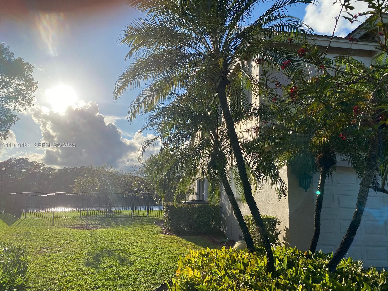 3279 Huntington Weston, FL 33332 - Photo 37 of 40 a view of a yard with an tree