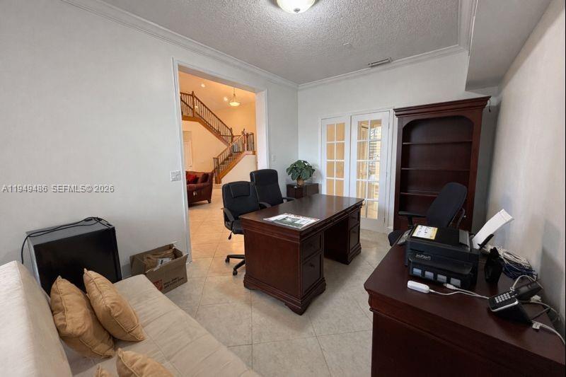 3279 Huntington Weston, FL 33332 - Photo 6 of 40 a living room with furniture a flat screen tv and a window