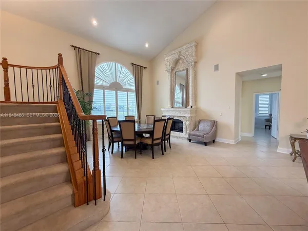 a view of livingroom with furniture and staircase