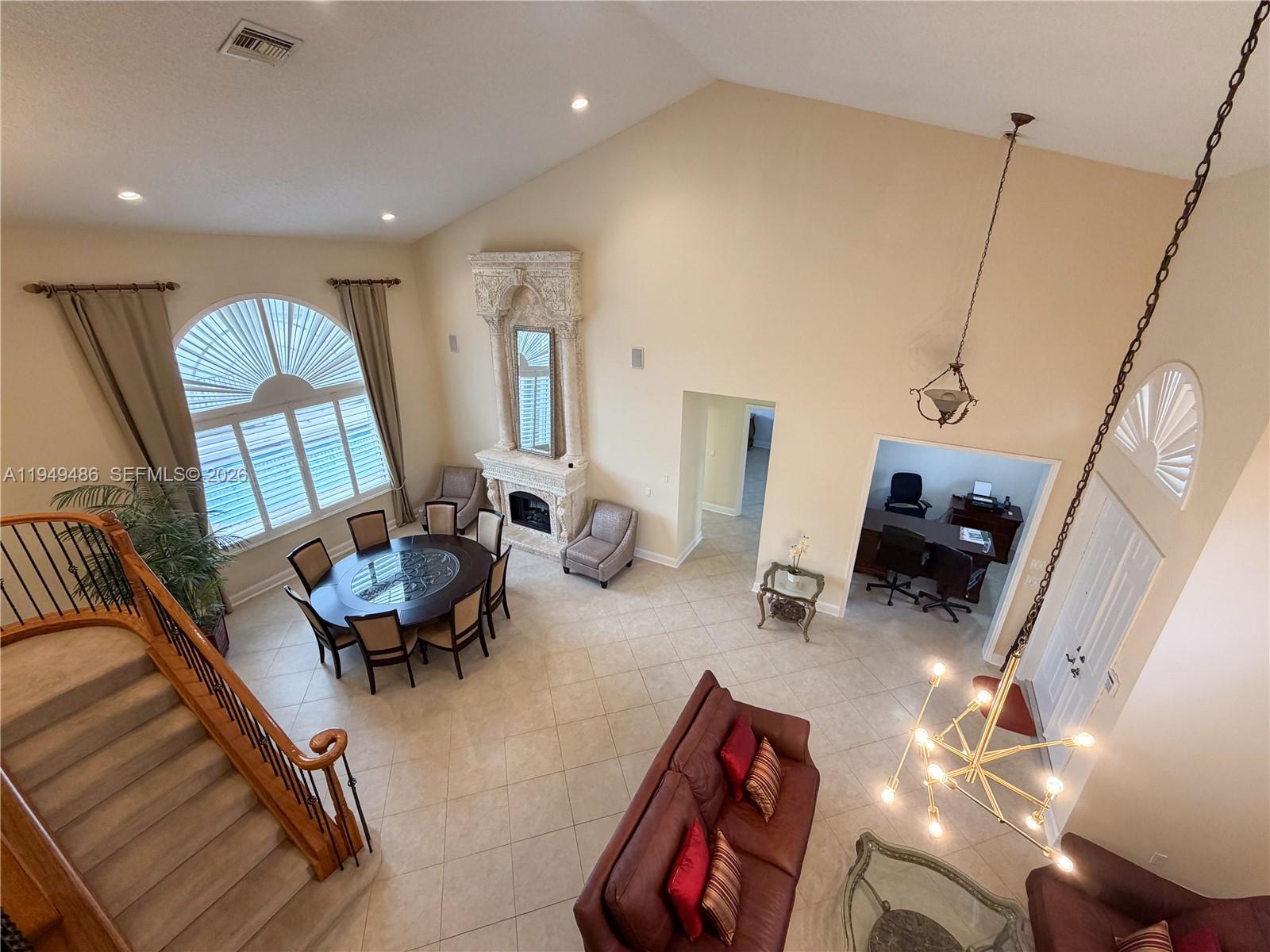 3279 Huntington Weston, FL 33332 - Photo 10 of 40 a living room with furniture and a wooden floor