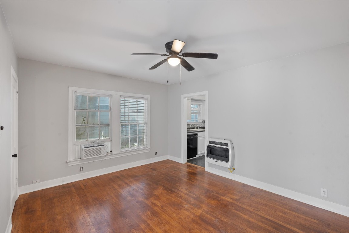 4337 Jefferson Street, Unit 1 Houston, TX 77023 - Photo 11 of 13 a bedroom with a bed and a large window