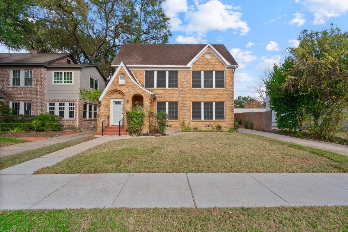 4337 Jefferson Street, Unit 1 Houston, TX 77023 - Photo 12 of 13 a front view of a house with a garden