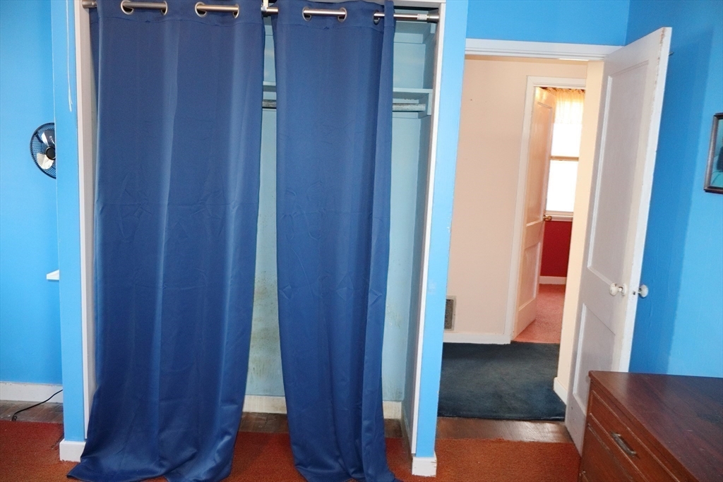 55 Blackstone Road Weymouth, MA 02191 - Photo 16 of 20 a view of a hallway with wooden floor