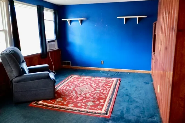 a kitchen with a refrigerator and a stove