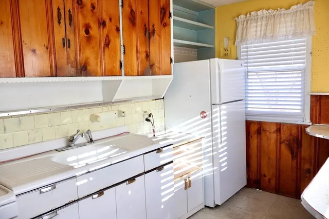 a view of a bathroom from the hallway
