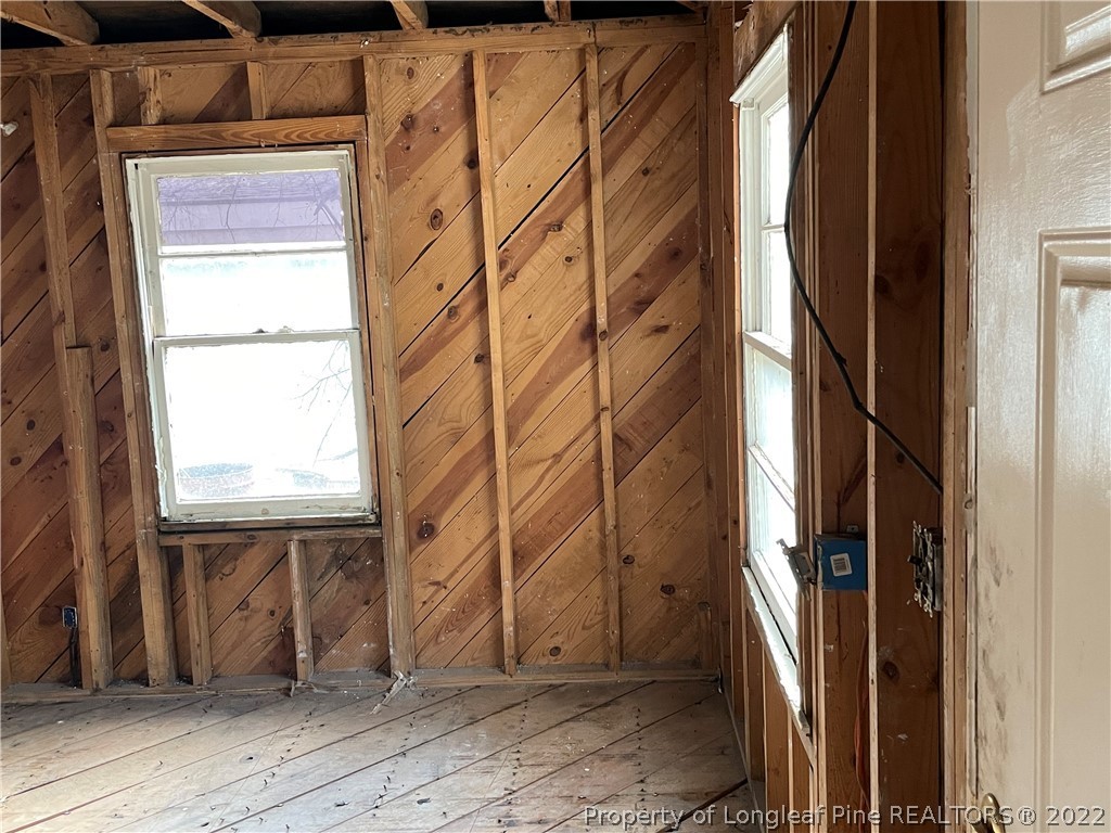 324 Rhew Street Fayetteville, NC 28303 - Photo 15 of 50 a view of a door and wooden door