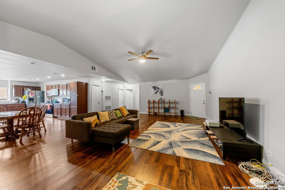 7131 Apache Converse, TX 78109 - Photo 4 of 14 a living room with furniture and wooden floor