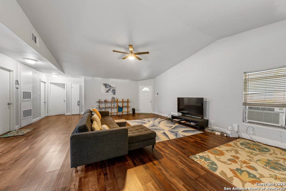 7131 Apache Converse, TX 78109 - Photo 5 of 14 a living room with furniture and a flat screen tv