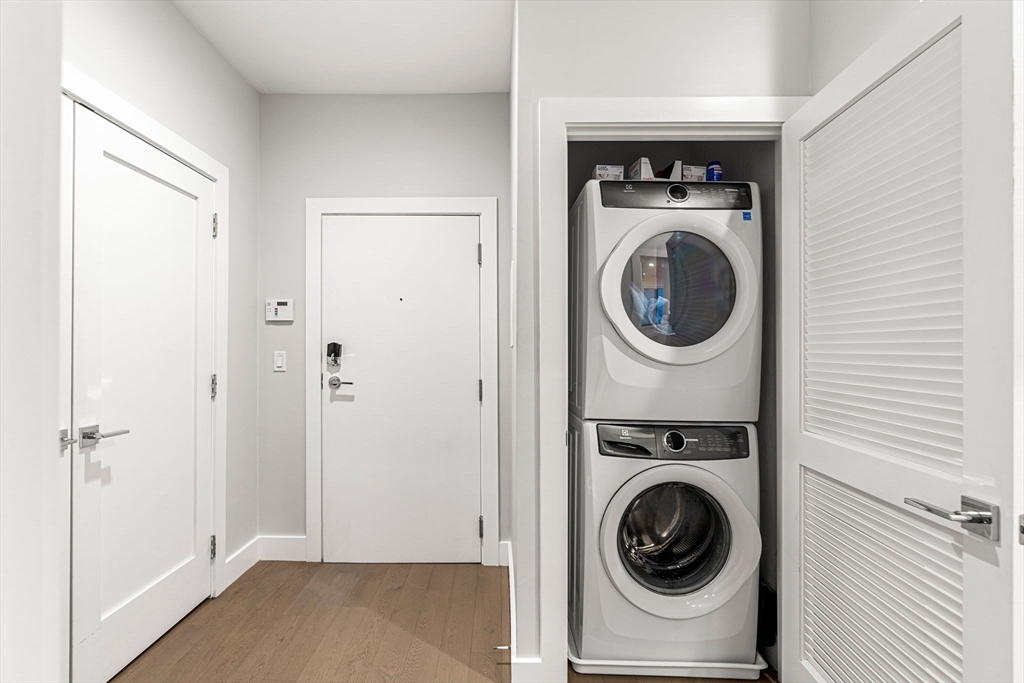 39 A Street, Unit 4 Boston, MA 02127 - Photo 22 of 28 a view of a storage & utility room with a washer dryer