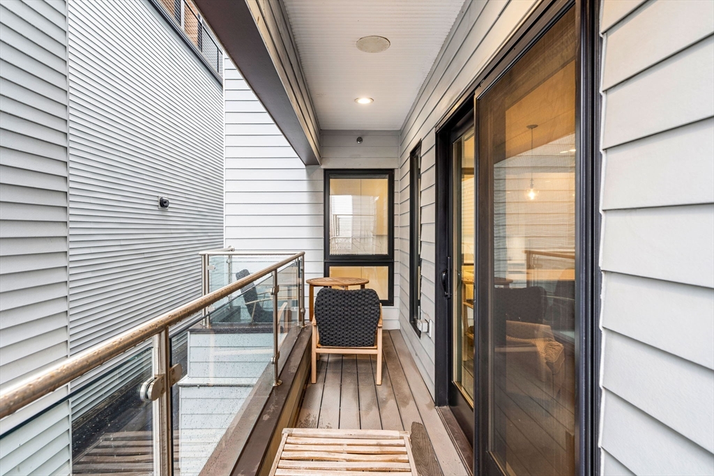 39 A Street, Unit 4 Boston, MA 02127 - Photo 23 of 28 a view of balcony with couch