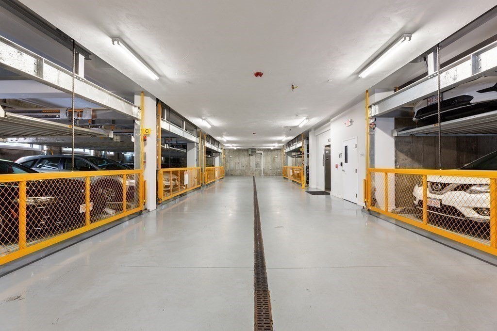 39 A Street, Unit 4 Boston, MA 02127 - Photo 26 of 28 a view of a hallway with stairs