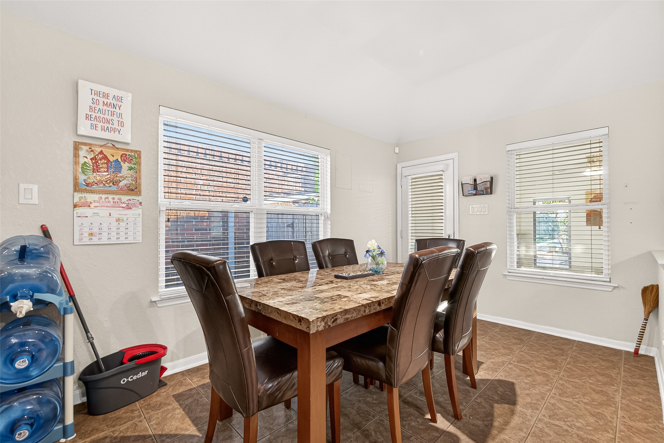 16715 Mackenzie Mesa Drive Spring, TX 77379 - Photo 17 of 50 a view of a dining room with furniture and window