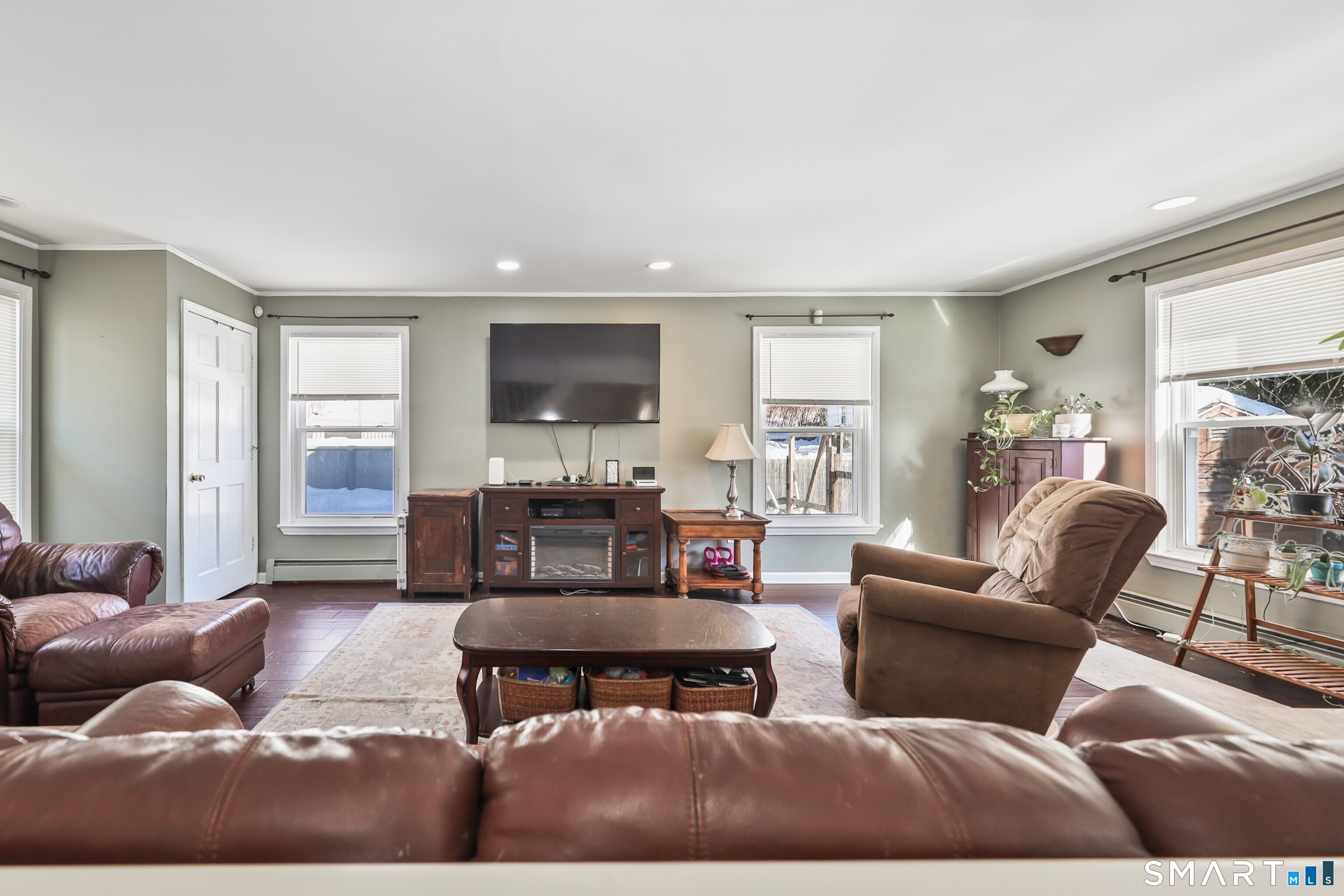 28 Beacon Street Beacon Falls, CT 06403 - Photo 13 of 38 a living room with furniture and a flat screen tv