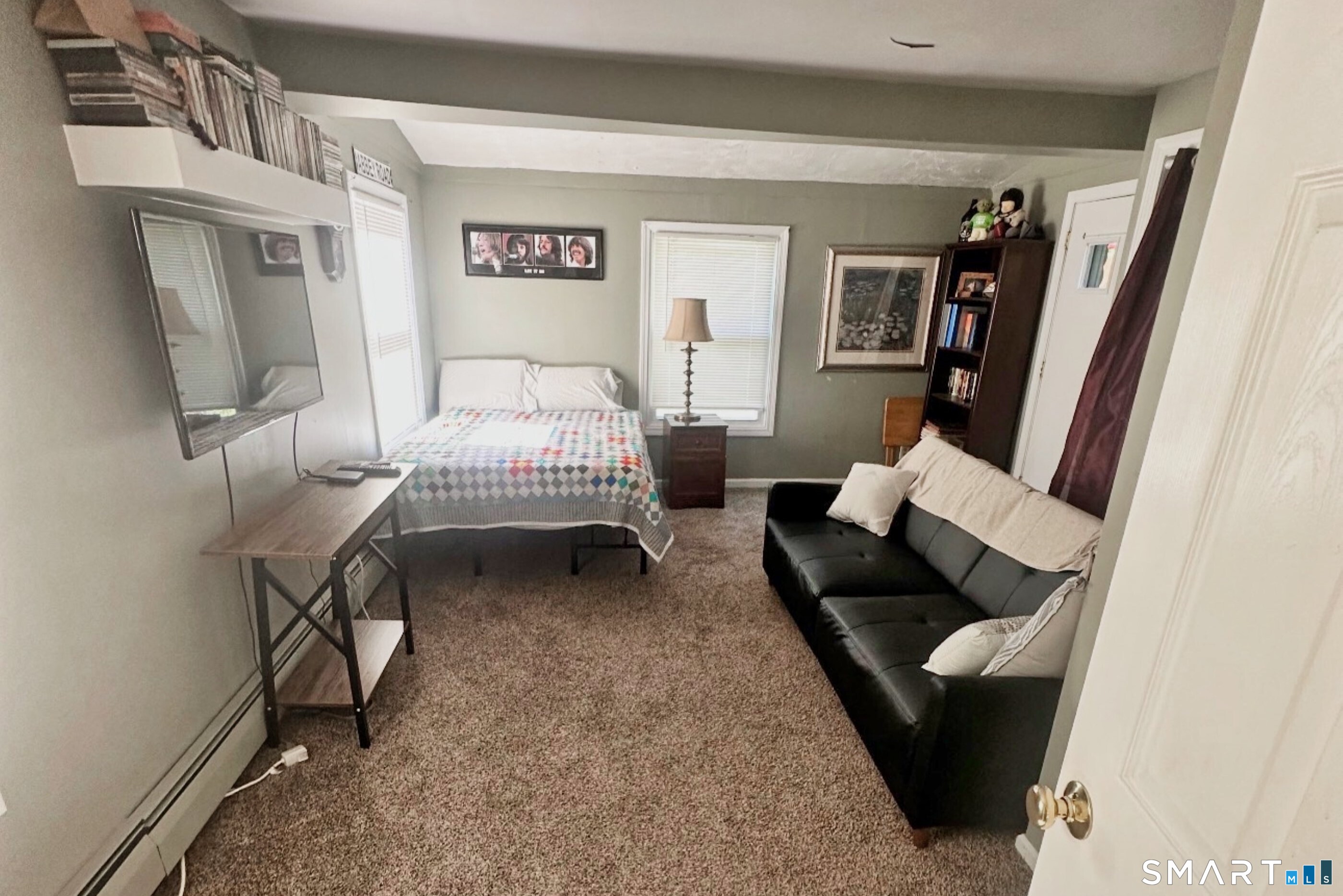 28 Beacon Street Beacon Falls, CT 06403 - Photo 2 of 38 a living room with furniture and a rug