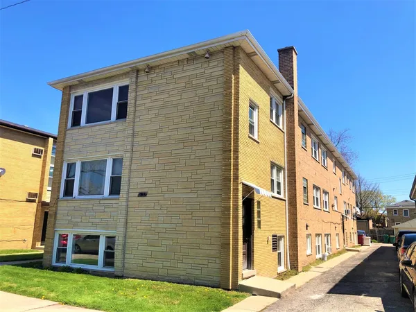 a brick building with a large windows