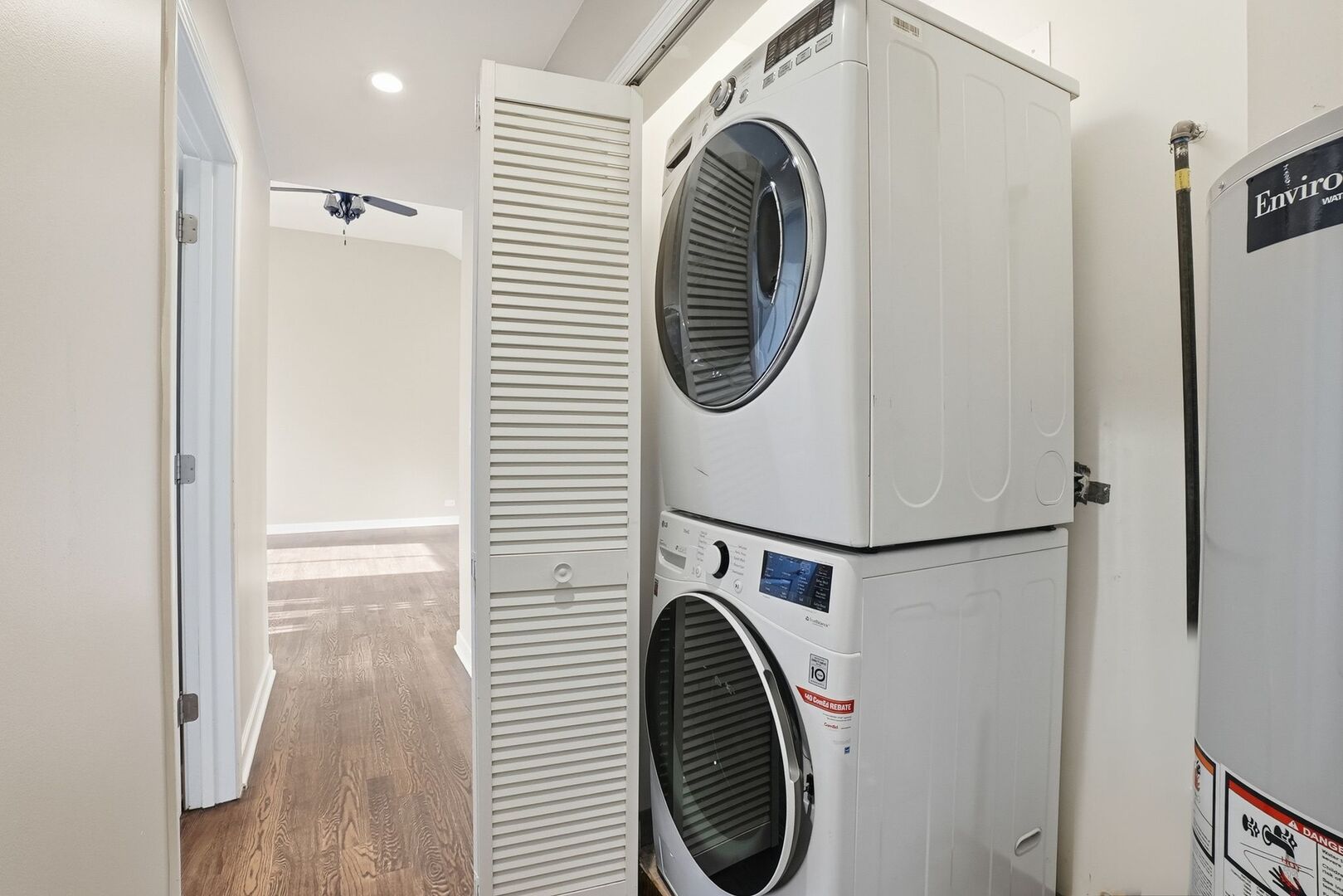 8718 Cranbrook Lane Bridgeview, IL 60455 - Photo 13 of 24 a view of a hallway with washer and dryer