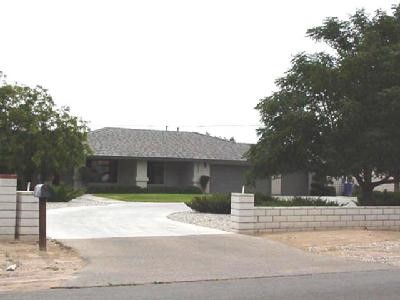 19311 Yanan Road Apple Valley, CA 92307 - Photo 1 of 1 a view of a house with a yard