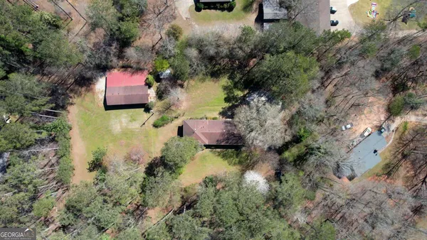 an aerial view of residential house with outdoor space