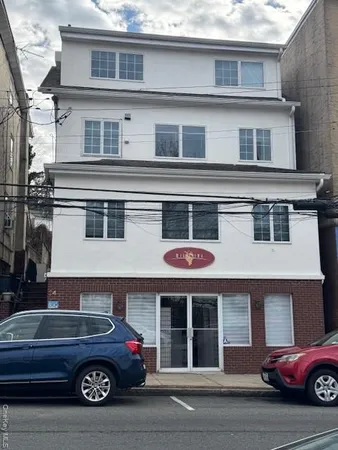 a car parked in front of a house