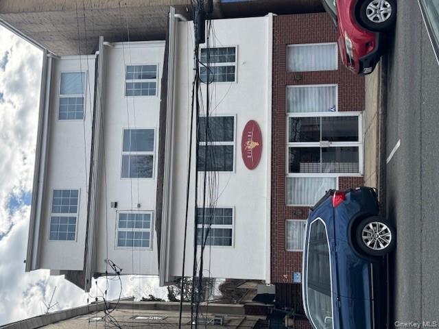 a car parked in front of a house