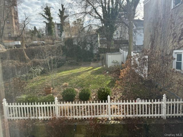 34 Main Street, Unit 2 Dobbs Ferry, NY 10522 - Photo 15 of 21 a view of a wooden fence