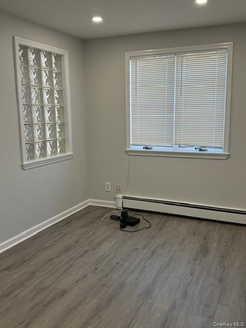34 Main Street, Unit 2 Dobbs Ferry, NY 10522 - Photo 8 of 21 a view of an empty room with wooden floor and a window