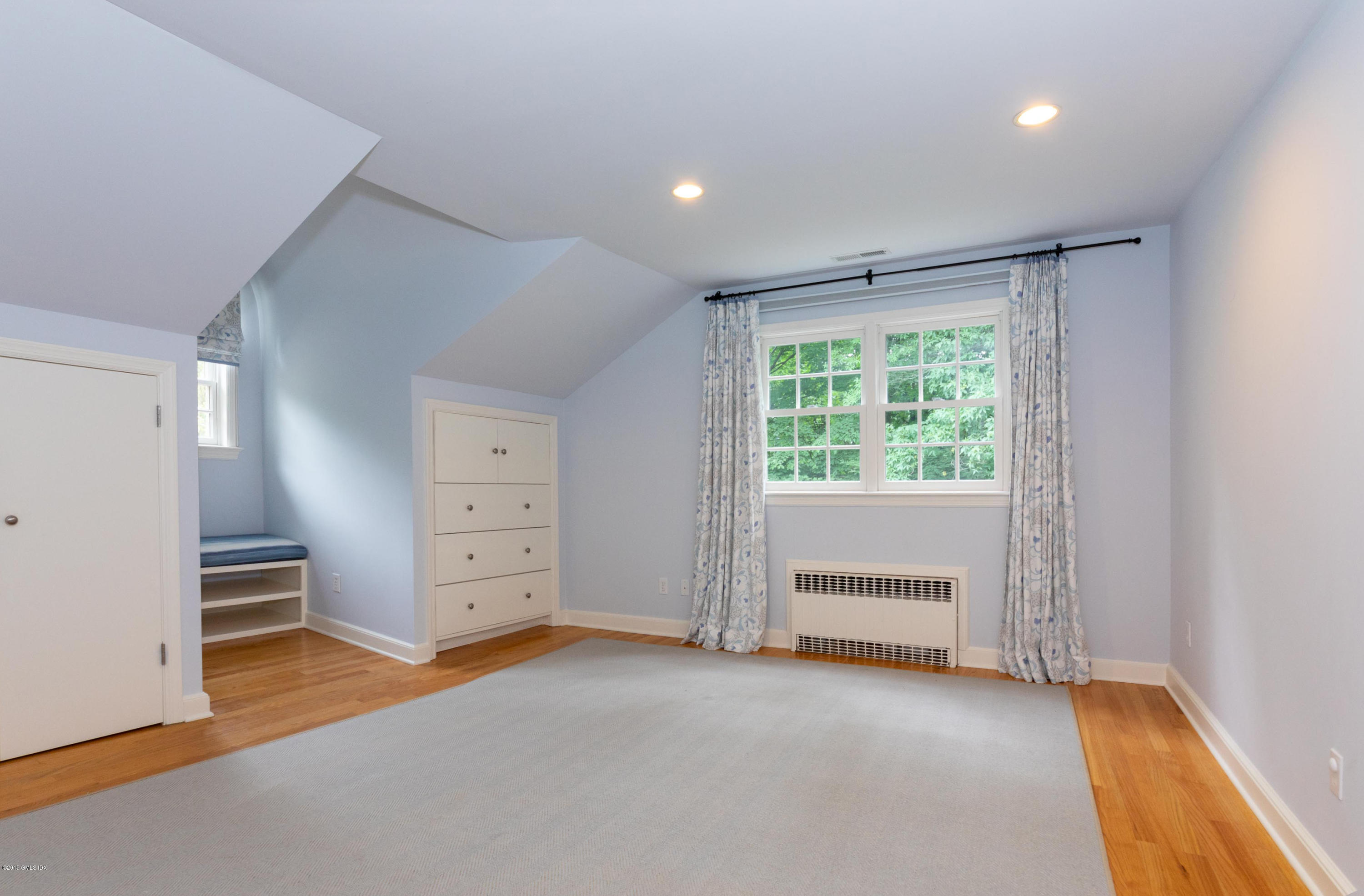 178 Cat Rock Road Cos Cob, CT 06807 - Photo 15 of 26 wooden floor in an empty room with a window