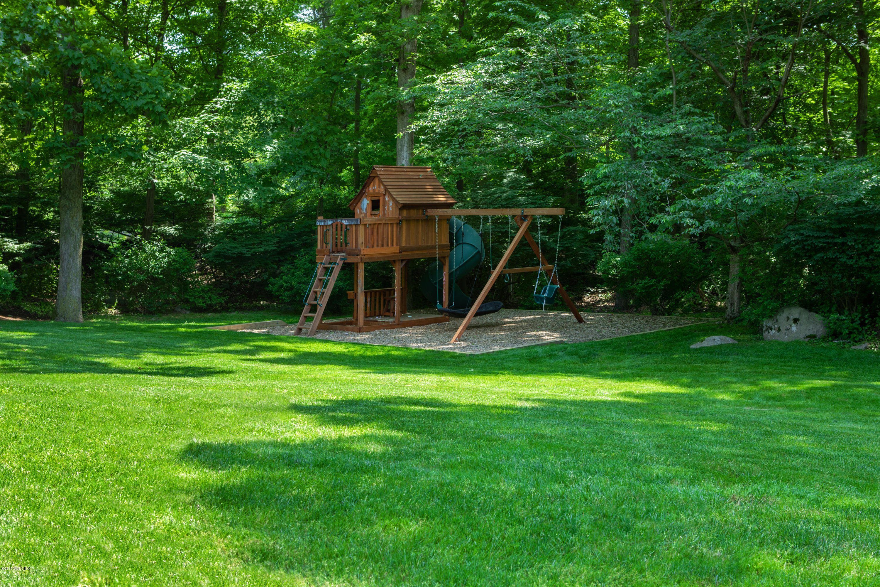 178 Cat Rock Road Cos Cob, CT 06807 - Photo 20 of 26 a view of a park with a slide