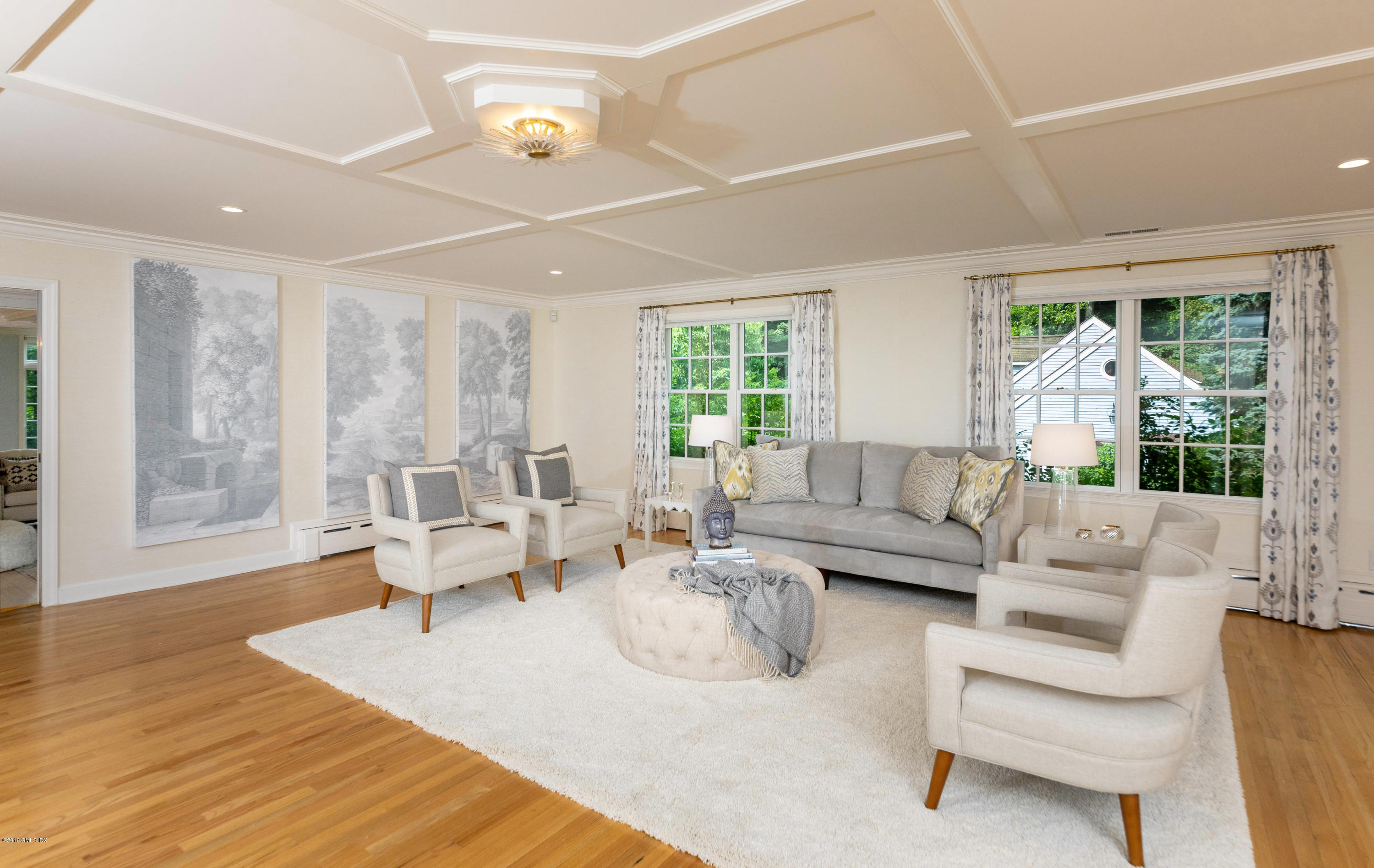 178 Cat Rock Road Cos Cob, CT 06807 - Photo 3 of 26 a living room with furniture and a large window