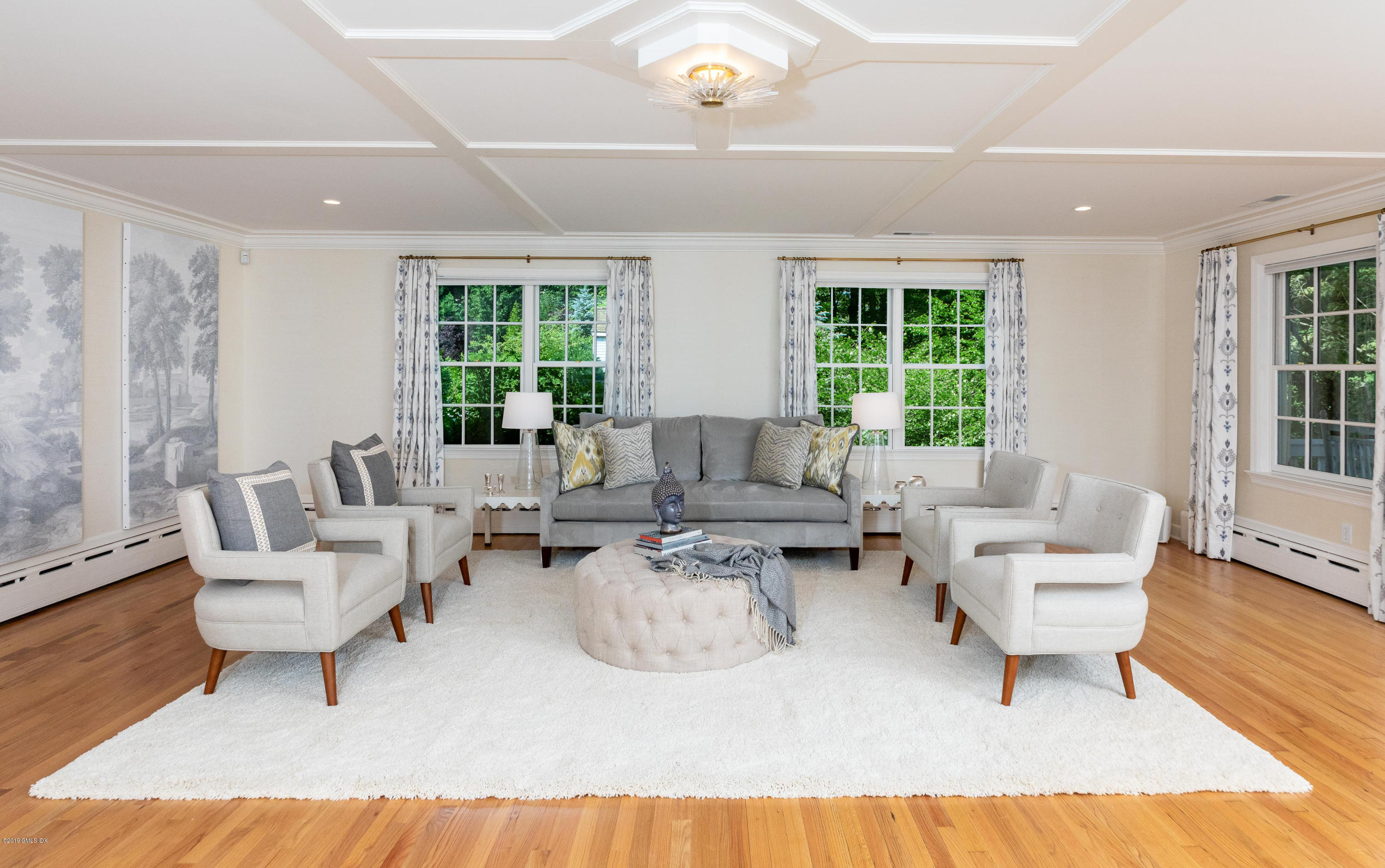 178 Cat Rock Road Cos Cob, CT 06807 - Photo 4 of 26 a living room with furniture and a large window