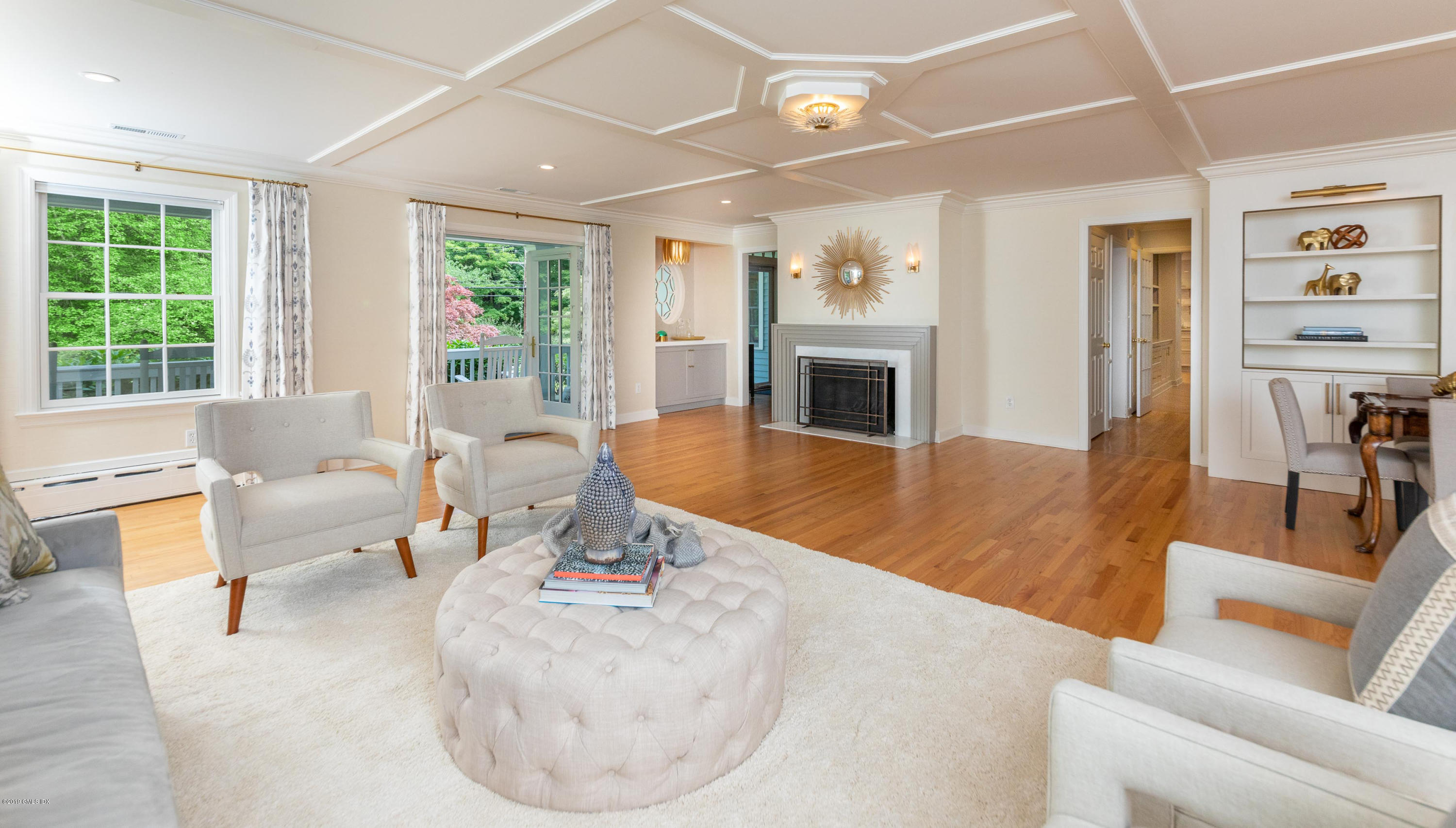 178 Cat Rock Road Cos Cob, CT 06807 - Photo 5 of 26 a living room with furniture large window and flat screen tv