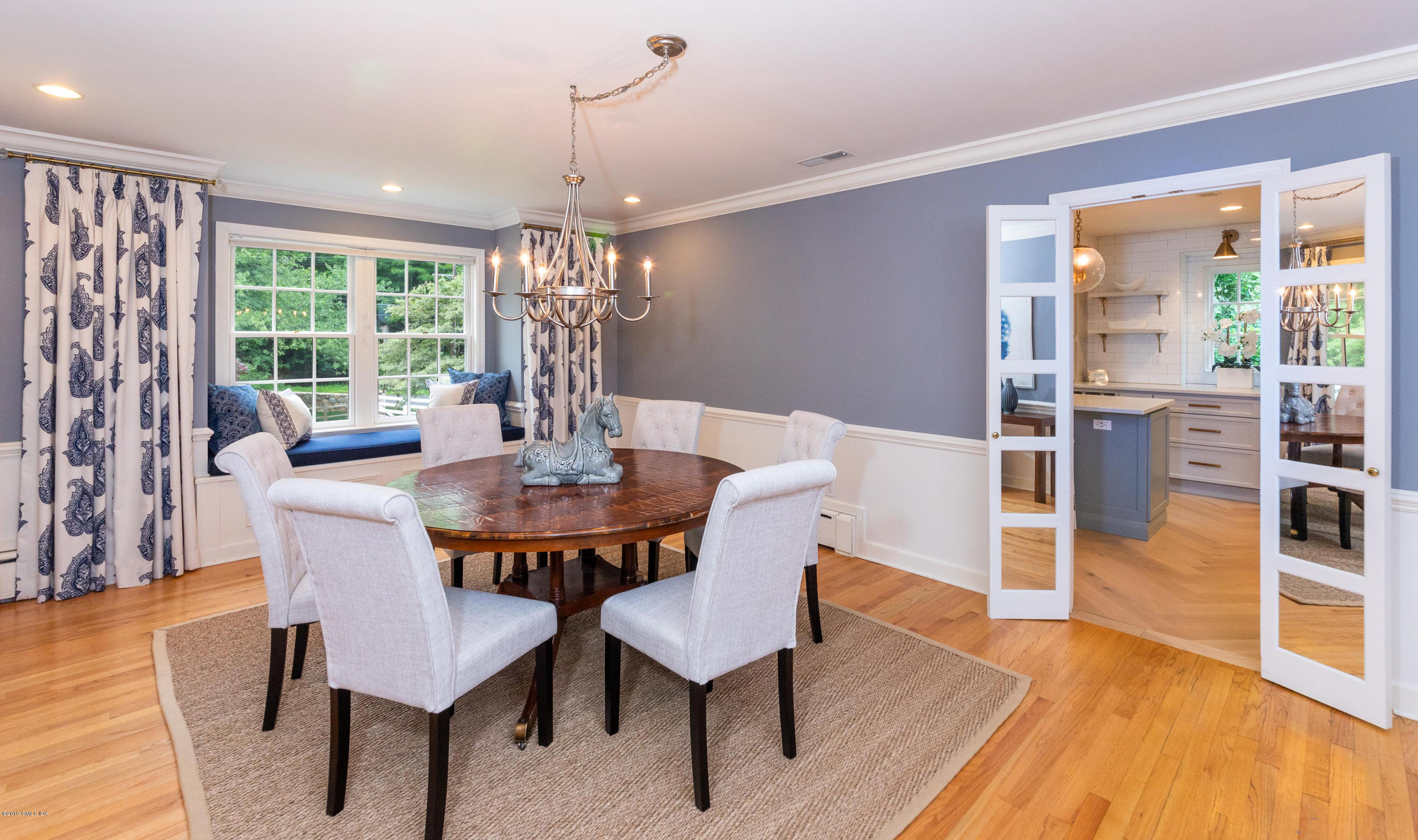 178 Cat Rock Road Cos Cob, CT 06807 - Photo 6 of 26 a view of a dining room with furniture window and wooden floor