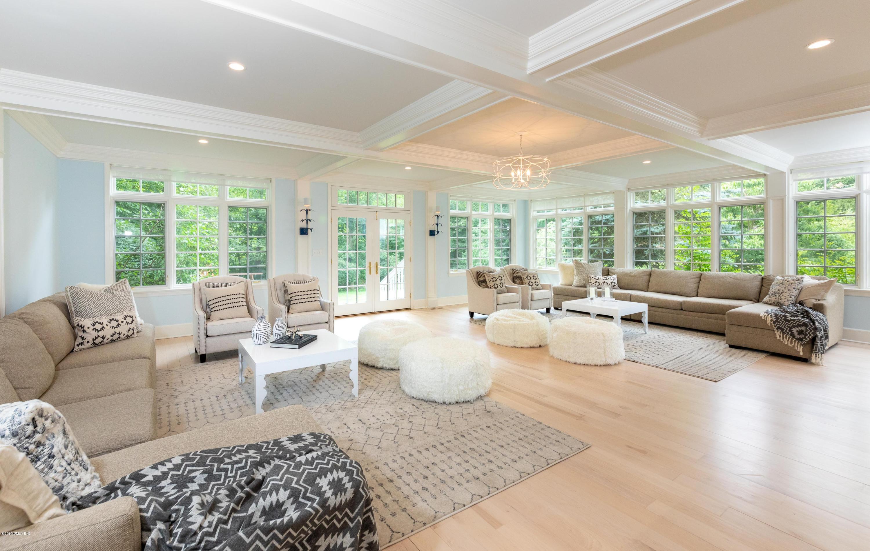 178 Cat Rock Road Cos Cob, CT 06807 - Photo 7 of 26 a living room with furniture and a large window