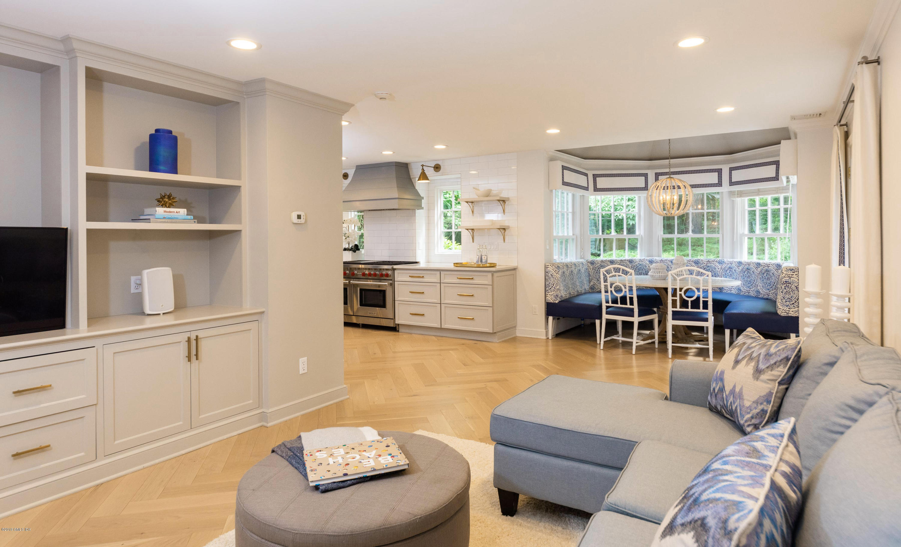 178 Cat Rock Road Cos Cob, CT 06807 - Photo 10 of 26 a living room with furniture and a large window