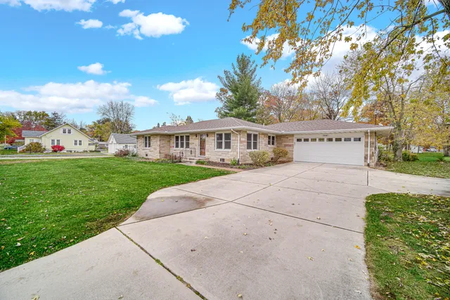 a view of house with yard