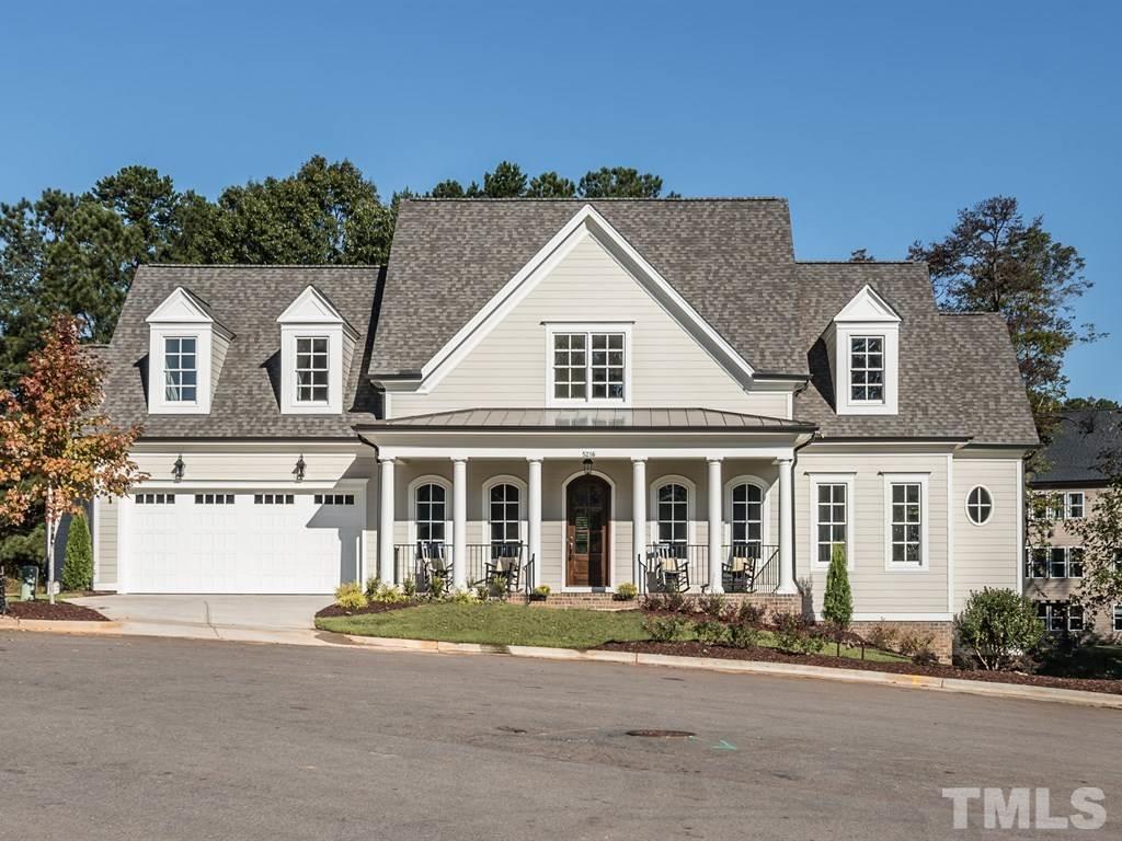 5216 Woodall Way, Unit 13 Raleigh, NC 27613 - Photo 1 of 25 front view of house with a street