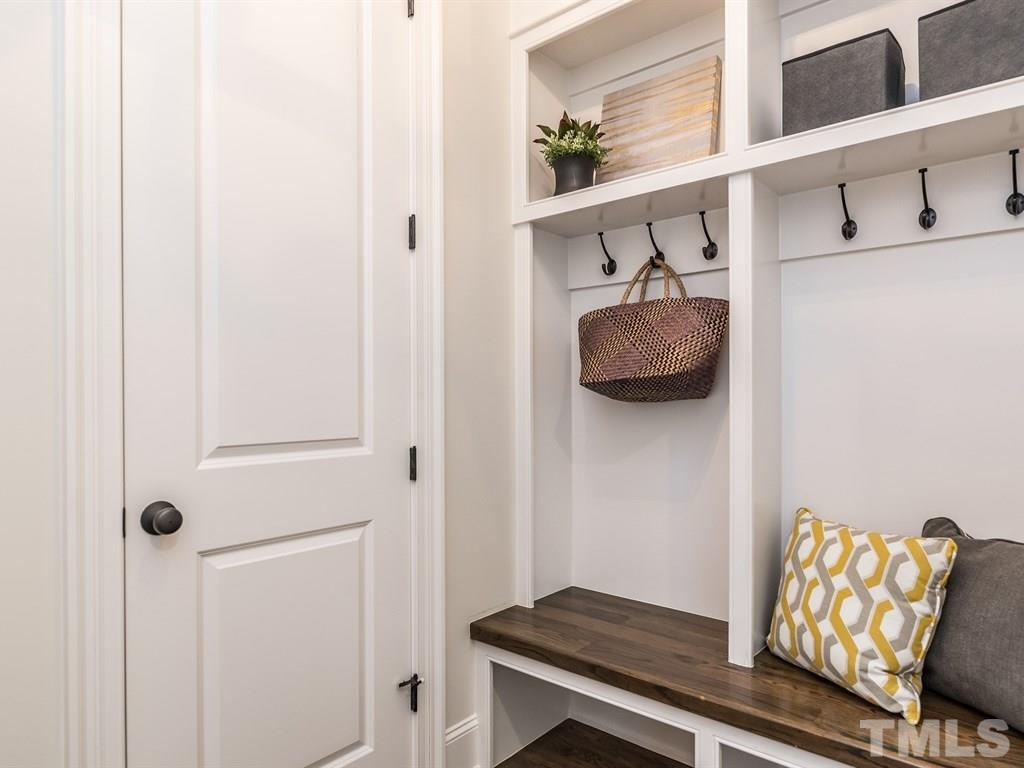 5216 Woodall Way, Unit 13 Raleigh, NC 27613 - Photo 11 of 25 a room with furniture and a potted plant